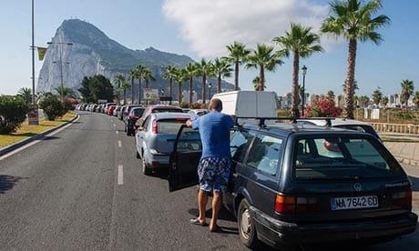 Motorists queue to cross